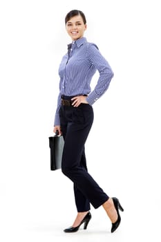 Portrait of pretty businesswoman posing before camera in isolation