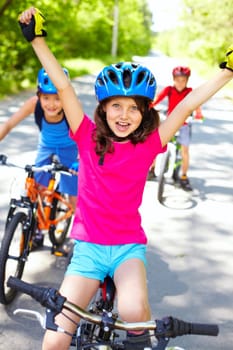 A little cyclist enjoying her victory