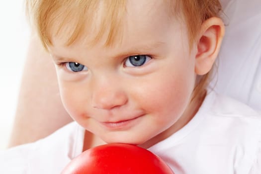 Portrait of adorable child smiling while thinking