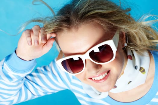 Portrait of beautiful fashion woman wearing sunglasses