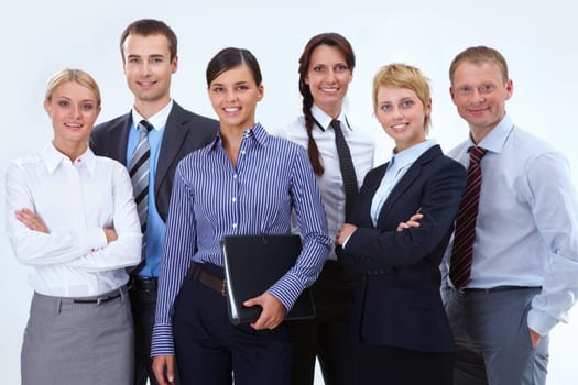 Portrait of friendly business team posing in front of camera
