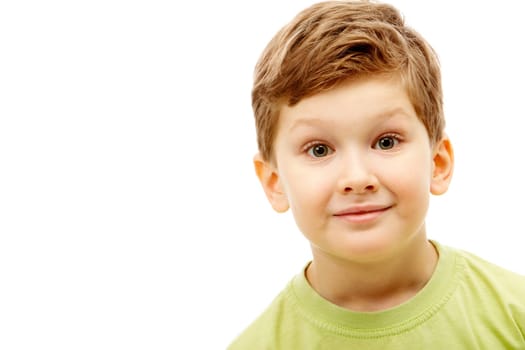 Portrait of young boy wearing green t-shirt isolated on a white background