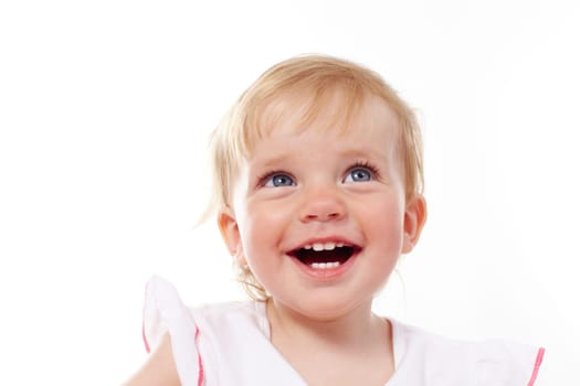 Portrait of cute child laughing in isolation