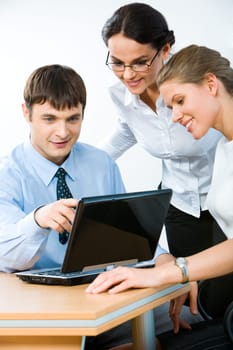Portrait of confident boss showing a new plan to coworkers