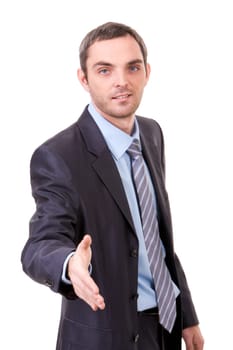 A man extending his hand to the business partner with a smile