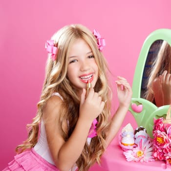 fashion little doll girl in pink vanity mirror with lipstick