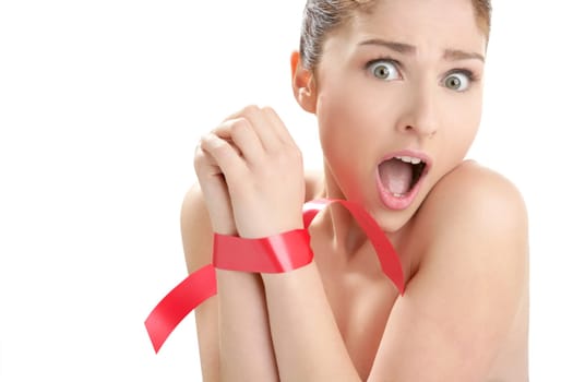 Beauty cosmetic portrait of funny tied hands woman with red tape