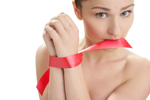 Beauty cosmetic portrait of funny tied hands woman with red tape