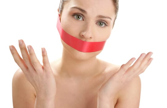 Beautiful woman with red tape on mouth portrait isolated on white