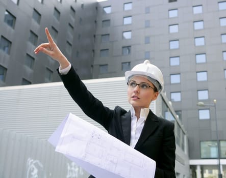 architect woman working outdoor with modern buildings