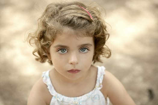 Girl, cute beautiful toddler, looking camera with innocence
