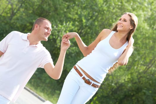 Portrait of affectionate couple walking outside