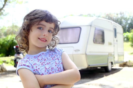 little children girl posing caravan camping vacations summer