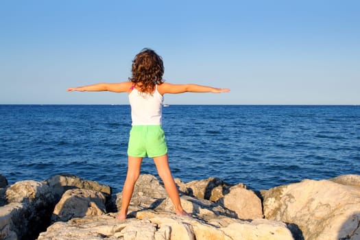 open arms girl looking blue ocean sea feeling freedom in vacation