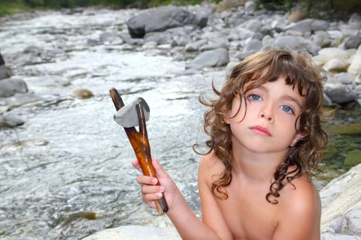 girl in river wood stick and stone as primitive human metaphor