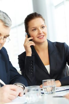 A young businesswoman talking on the phone