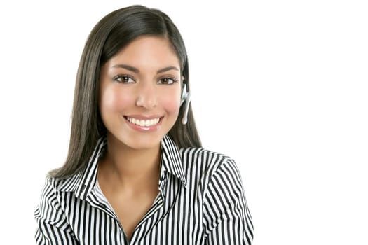 Beautiful young businesswoman talking with headset phone over white background
