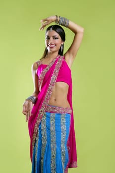 Brunette indian dancer princess Bollywood style, colorful sari
