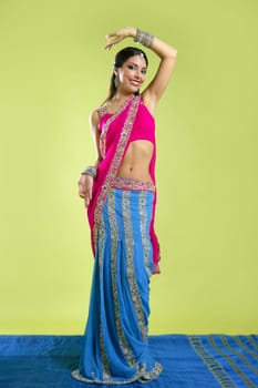 Brunette indian dancer princess Bollywood style, colorful sari