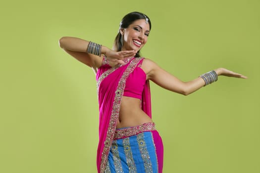 Brunette indian dancer princess Bollywood style, colorful sari