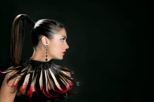 Brunette from India profile fashion portrait with feathers