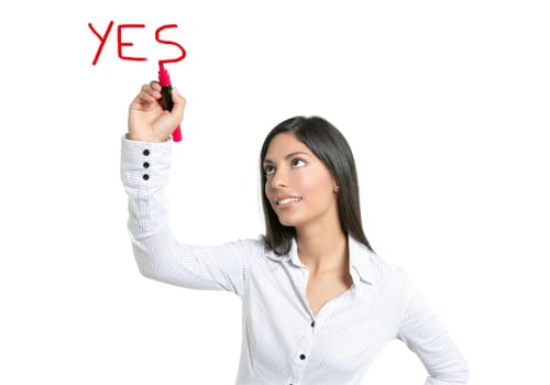 Brunette businesswoman writing word YES on a copyspace