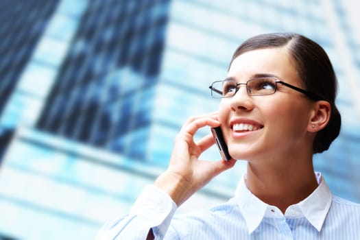Photo of smart businesswoman calling somebody by mobile telephone