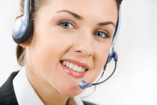 Face of charming confident woman with headset