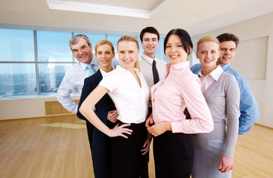 Portrait of successful business people looking at camera