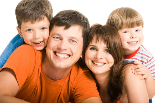 Portrait of joyful family laughing and looking at camera on white background