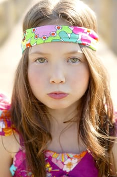 Portrait of beautiful teen girl outdoors in summertime