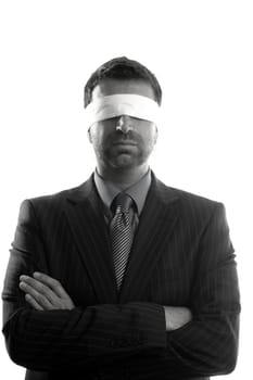 Blindfolded businessman over white background, conceptual image