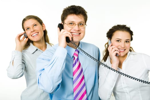 Portrait of three consultants speaking on the telephones