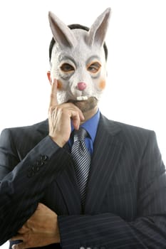 Businessman with funny rabbit mask over white studio background