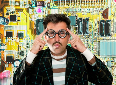 Genius nerd electronic engineer tech man thinking gesture electronics motherboard chip background