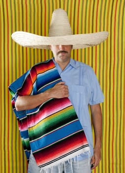 Mexican man serape poncho hat sombrero yellow stripes background
