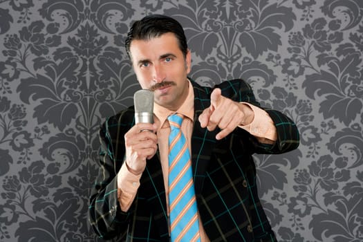 retro mustache singer man tacky suit on vintage wallpaper background