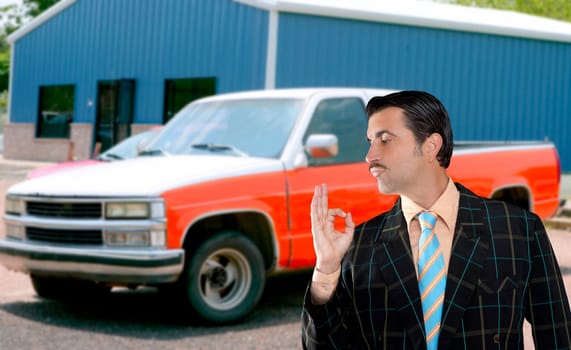 car used salesperson selling old car as brand new  typical topic salesman with hand ok gesture