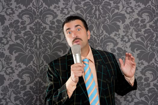 retro mustache singer man tacky suit on vintage wallpaper background