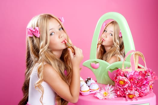 fashion little doll girl in pink vanity mirror with lipstick
