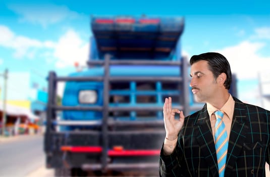 car used salesperson selling old car as brand new  typical topic salesman with hand ok gesture