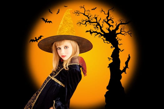 Halloween beautiful girl in dried tree and bat orange background