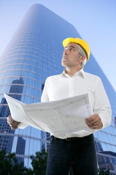 expertise architect senior engineer plan looking up city construction buildings