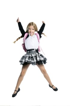 full length stand up little blond school girl with backpack bag high jump on white background