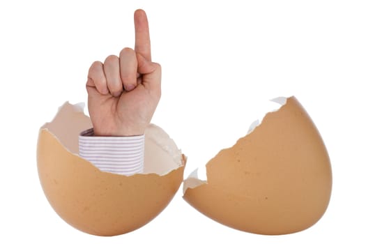 Birth of new idea. Broken egg with hand on white background