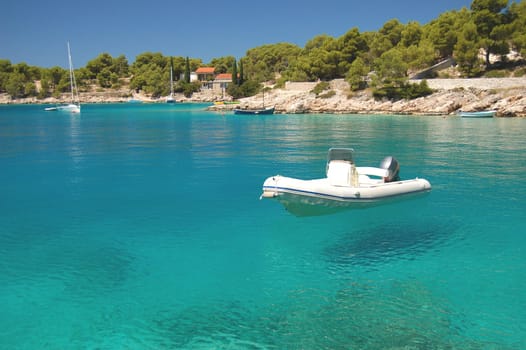 Boat in a quiet bay of Milna on Brac island, Croatia