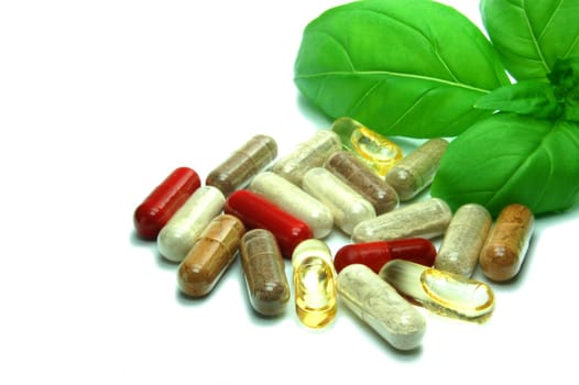 Herbal capsule in basil leaf