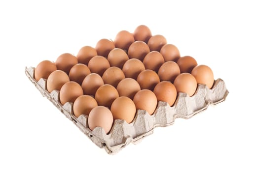 Carton of fresh brown eggs