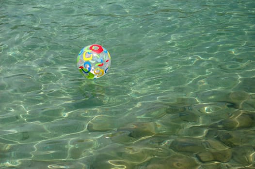 Colored ball on Adriatic water