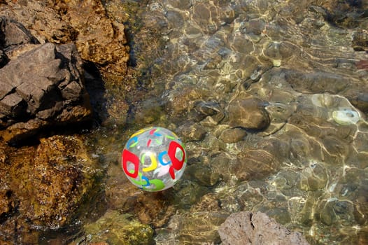Colored ball on Adriatic water